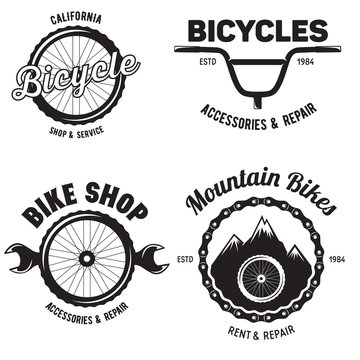 Set of vintage and modern bike shop logo badges and labels. Cycle wheel isolated vector.
