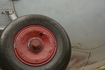 Old helicopter wheel close up