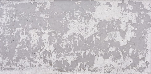 Fototapeta premium Cracked white paint on concrete