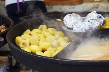 Cooking food for people at a festival