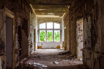 Fototapeta na wymiar The old and ruined room of a building, lost places