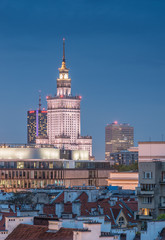 Warsaw, Poland, communist skyscraper Palace of Culture and Science over old city roofs