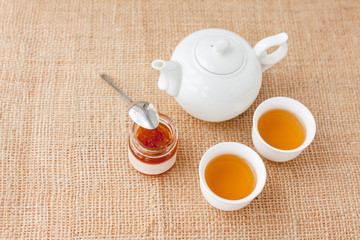 Cup of tea with teapot