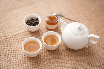 Cup of tea with teapot