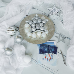 Silver baubles and blue Christmas cards