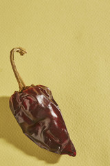 a whole dried, roasted, Mesilla chili pod