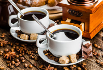 Breakfast with coffee and croissants on table