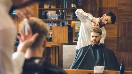 Young Man in Barbershop Hair Care Service Concept