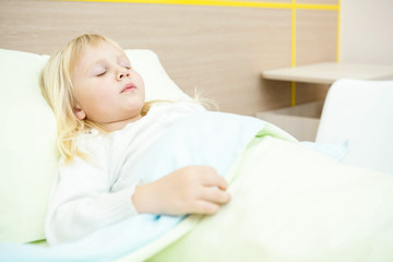 Fototapeta premium Adorable pretty little girl sleeping in bed