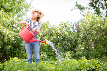 Young woman in garden © Evgenia Tiplyashina