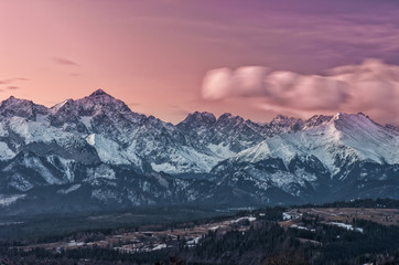 Fototapeta na wymiar Dawn panorama of snowyTatra Mountains, Poland