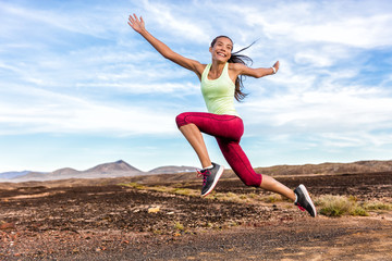 Fototapeta na wymiar Success freedom carefree runner woman running fun