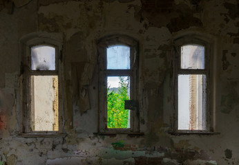 Fototapeta premium The old and ruined widow of building, lost places