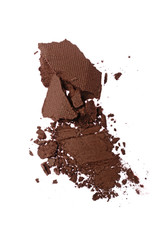 Smear of crushed brown eyeshadow as sample of cosmetic product