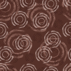 Seamless pattern of brown circles, overlapping each other, made by hand by brush with ink. Vector