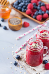 Healthy mixed smoothie for breakfast with berries, blueberry, raspberry