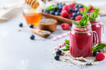 Healthy mixed smoothie for breakfast with berries, blueberry, raspberry