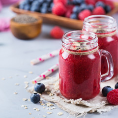 Healthy mixed smoothie for breakfast with berries, blueberry, raspberry