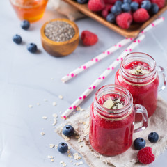 Healthy mixed smoothie for breakfast with berries, blueberry, raspberry