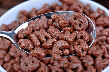 Cocoa cereals in a spoon