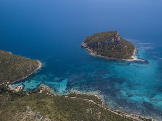 Aerial view of the Sardinian Emerald Coast, with its turquoise sea. in Sardinia Island, is one of...