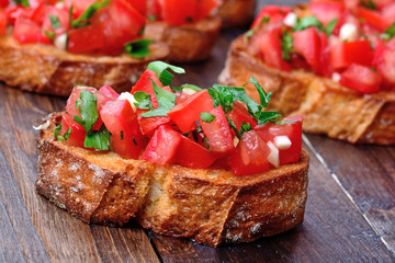 Group of bruschetta with tomatoes and garlic