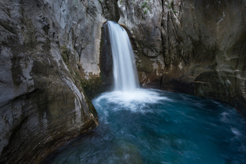 Fototapeta na wymiar Waterfall in mountain Sapadere canyon in Turkey