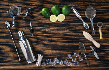 Set of bartending tools and limes