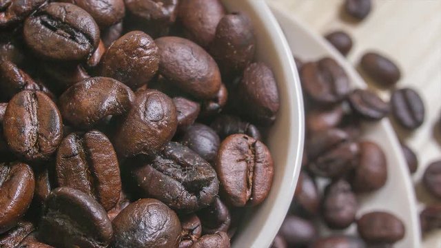 Roasted coffee beans close up footage image camera movement