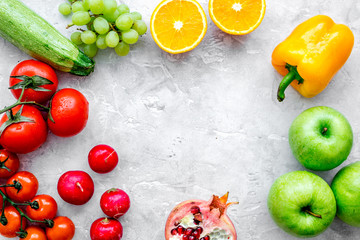 diet food with fresh fruits and vegetables salad stone background top view mockup