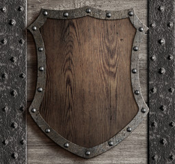 Fototapety  medieval wooden shield on castle gate 3d illustration