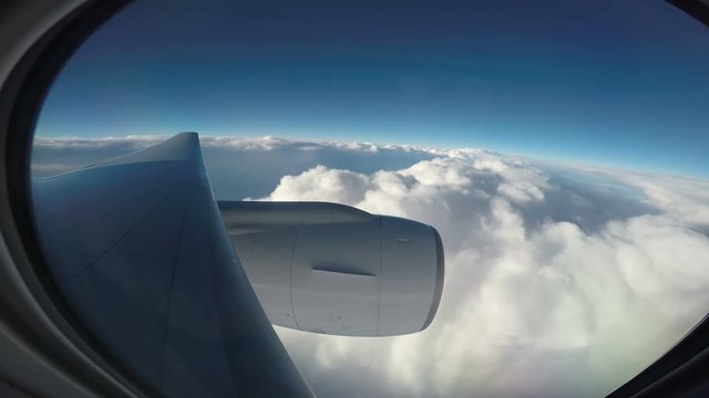 cloud scape through plane window