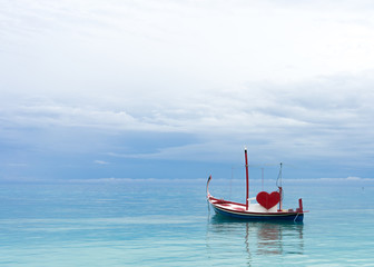 Fototapeta premium love boat in the ocean