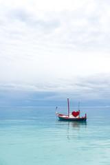 Fototapeta premium love boat in the ocean