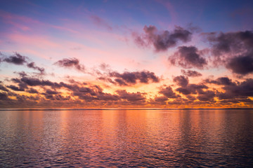 Colorful sunrise over tropical ocean