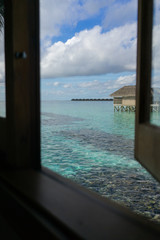 Water villas in tropical Maldives island