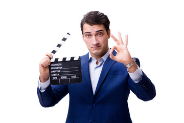Handsome man with movie clapper isolated on white
