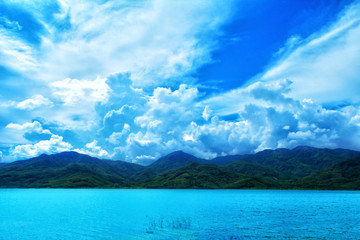 Mountain landscape with blue sky and fresh water lake  background