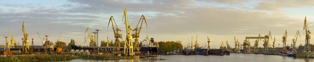 Fototapeta na wymiar Szczecin, Poland-May 2017: industrial areas of shipyards in Szczecin