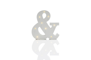 Decorative Ampersand with Embedded LED Lights Over White Background