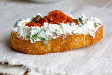 Bruschetta with ricotta cheese and tomato sauce form of heart