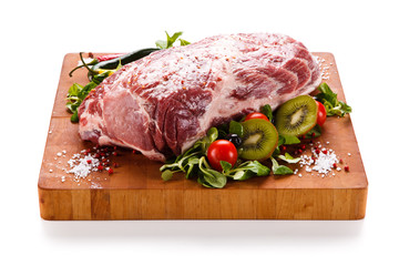 Fresh raw pork on cutting board on white background