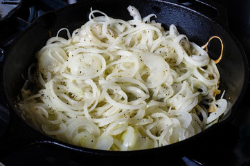 Onions carmaelizing in cast iron skillet
