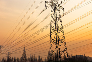 high voltage tower against the sunset background,china.