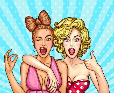 Fototapeta Ilustracja wektorowa pop-artu dwóch młodych czarujących dziewczyn demonstruje swoją rozkosz - jedna mrugnęła okiem i pokazuje znak OK, a drugi kciuki do góry.