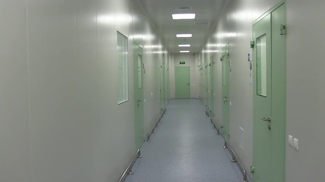 Light Corridor with Green Doors at the Laboratory