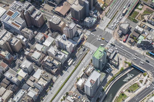 Tokyo urban area with streets and buildings, aerial view, Japan