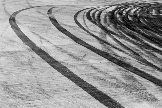 black tire tracks skid on road