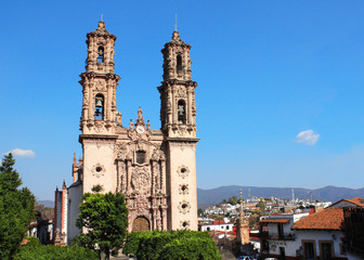 Fototapeta na wymiar Facade of Santa Prisca Parish Church, Taxco de Alarcon city, Mexico