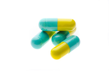 Pills on white background